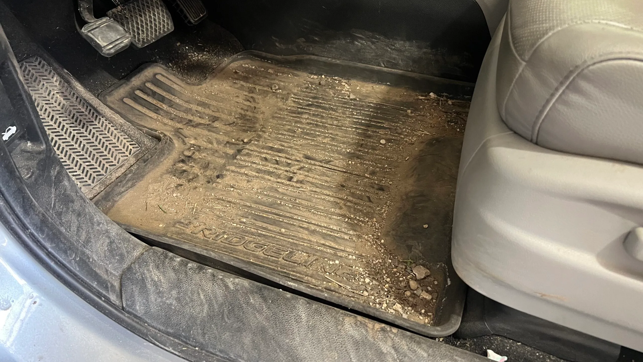 Dirty sedan interior before full car detailing